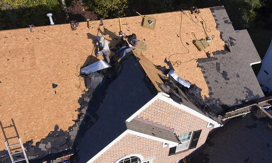 Roofing work reviewed for HOA architectural compliance